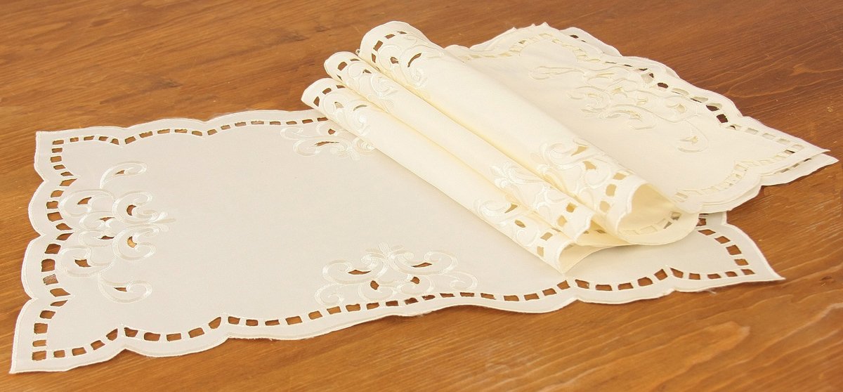 Set of 4 XD80506A Hampton Placemats featuring elegant cutwork and embroidery in white and ivory colors.